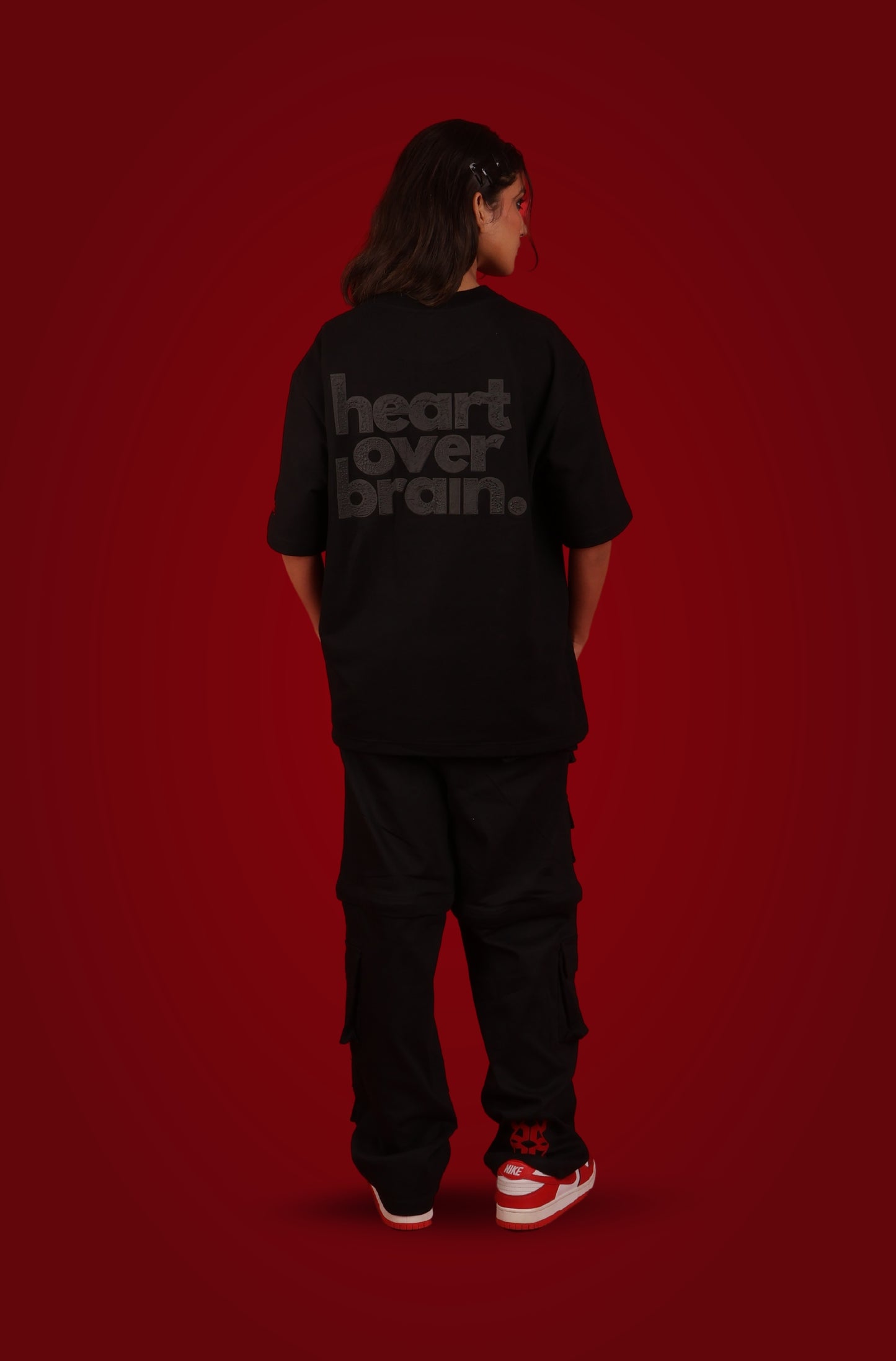 heart over brain. - black on black.